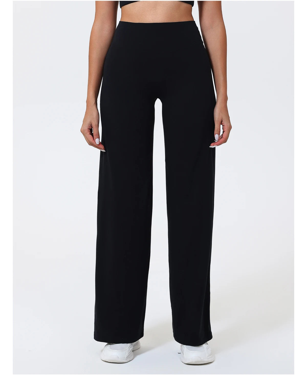 Black high waist compression leggings in quick-dry knit material for a smooth, sculpted fit during yoga workouts.