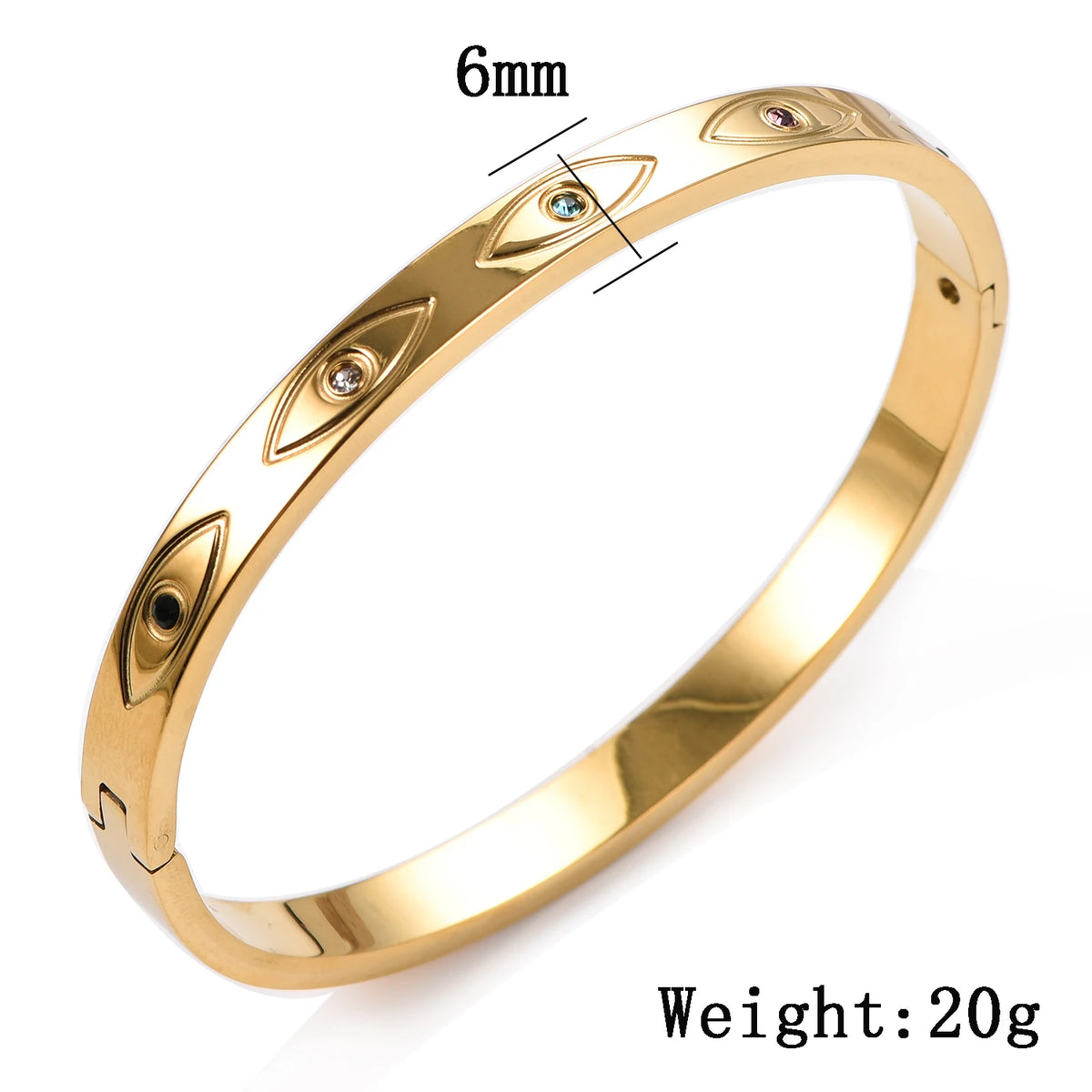 Gold stainless steel cuff bracelet with engraved evil eye motifs and inlaid crystal accents.