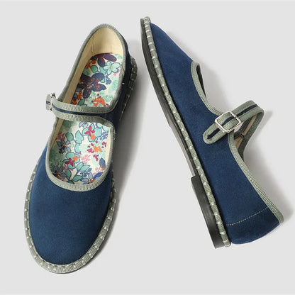 Women's floral-lined Mary Jane flats with buckle strap