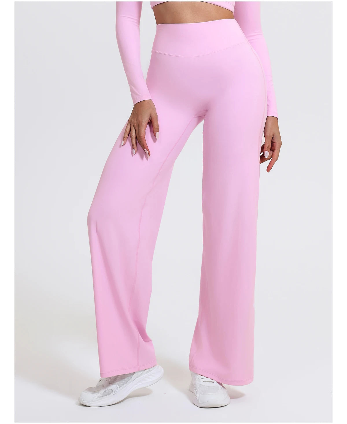 Light pink, high waist sculpting leggings in stretchy knit fabric for yoga.
