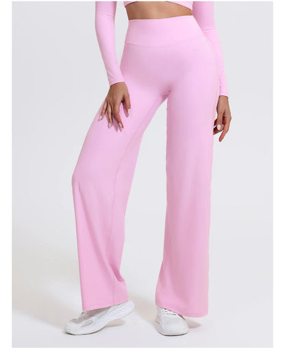 Light pink, high waist sculpting leggings in stretchy knit fabric for yoga.
