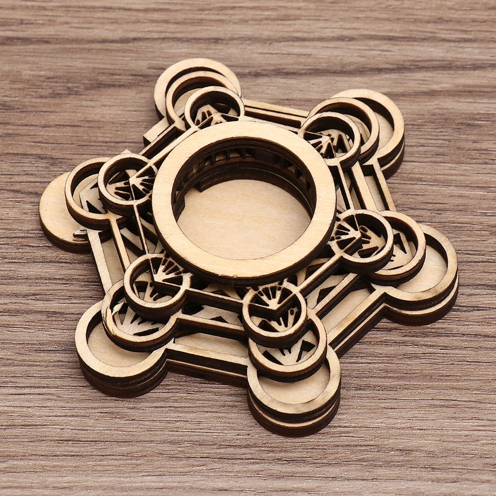 Brown laser-cut wooden crystal ball stand featuring a Metatron's Cube sacred geometry and lotus pattern.