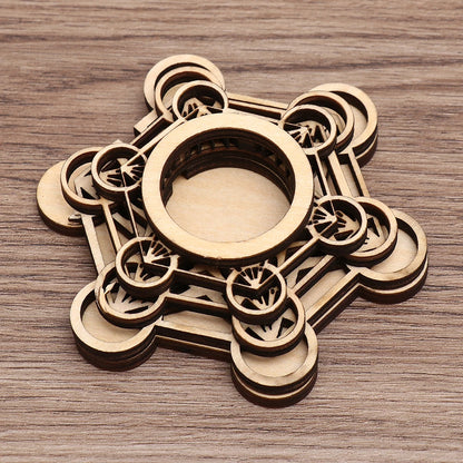 Brown laser-cut wooden crystal ball stand featuring a Metatron's Cube sacred geometry and lotus pattern.