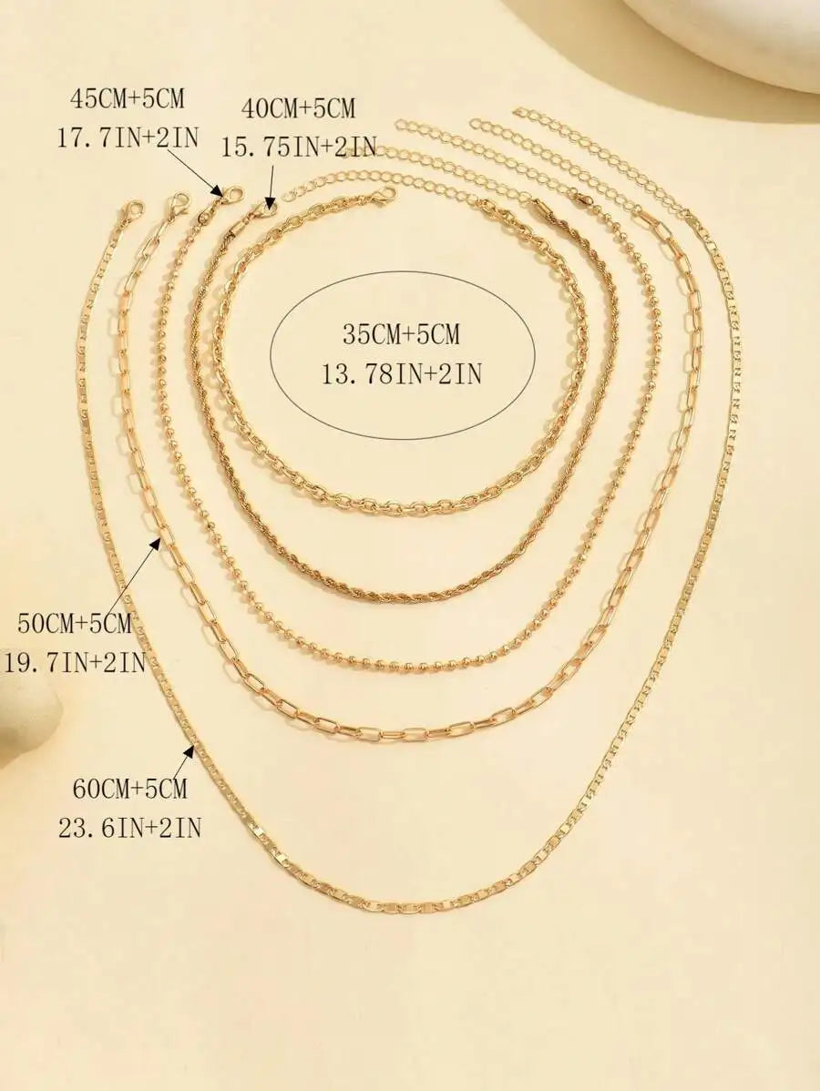 Women's Goldtone Necklace Set With Braided Bead Chains And Star Pendants In Five-Length Array