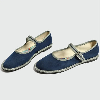 Women's floral-lined Mary Jane flats with buckle strap