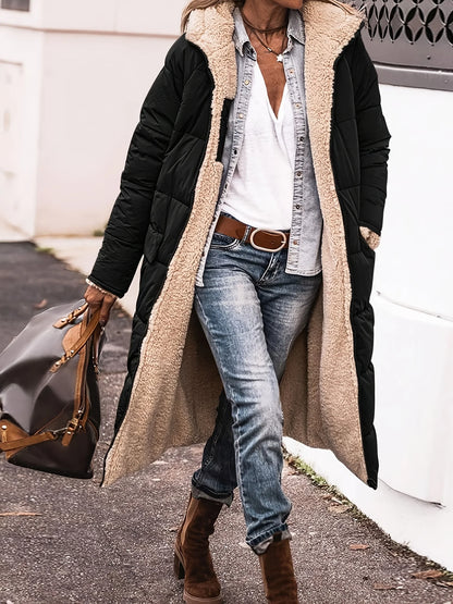 Women’s long hooded coat with zipper closure and pockets