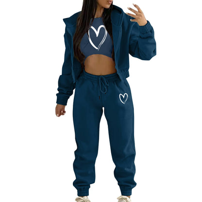 Blue knit hooded sweater set with white heart print, featuring a relaxed, stretchy fit for loungewear.