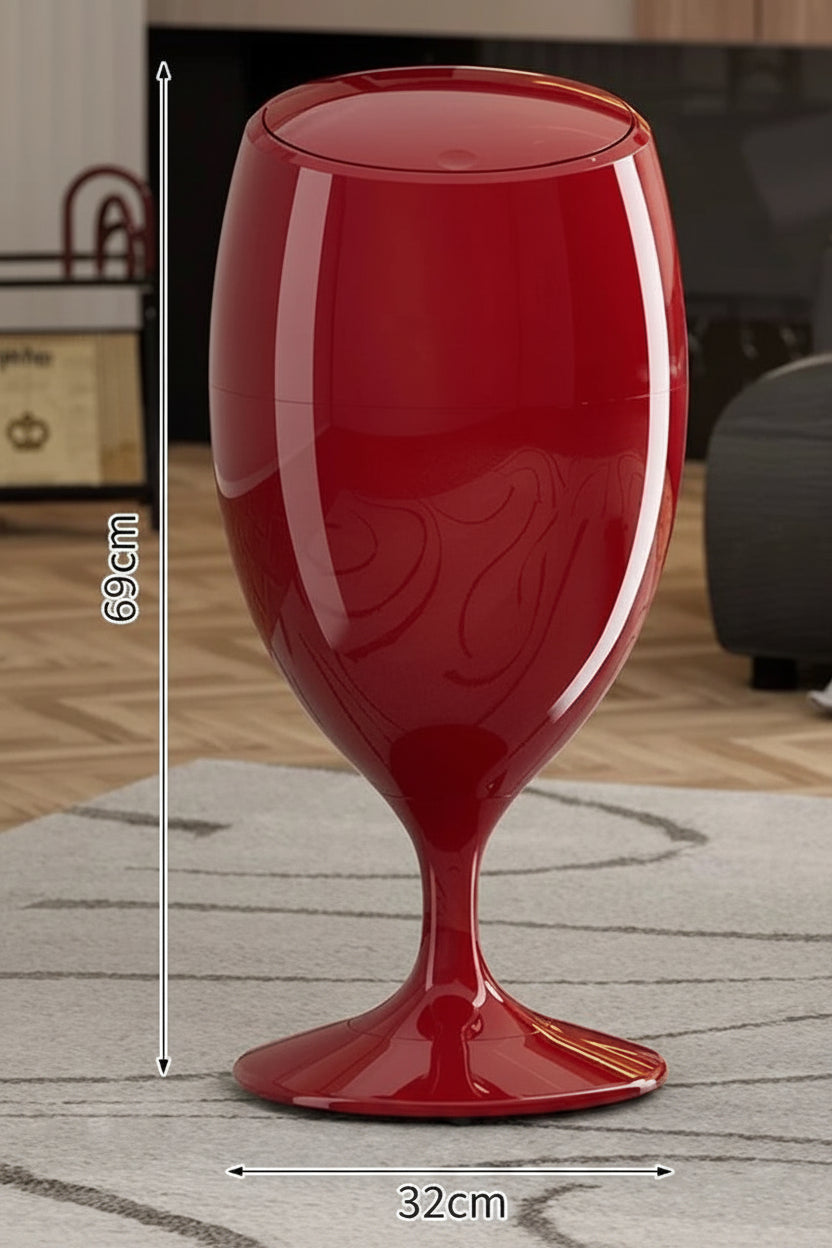 Red wine glass-shaped plastic trash can with dimension arrows and feature insets.