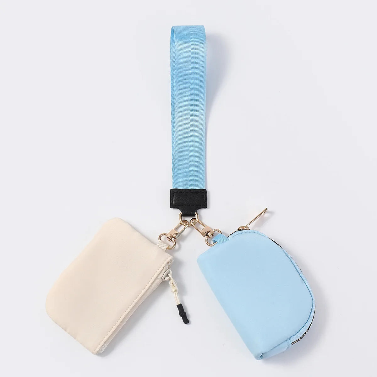 Light blue and cream dual nylon pouch wallet with zip closure and wrist strap for organized daily carrying.