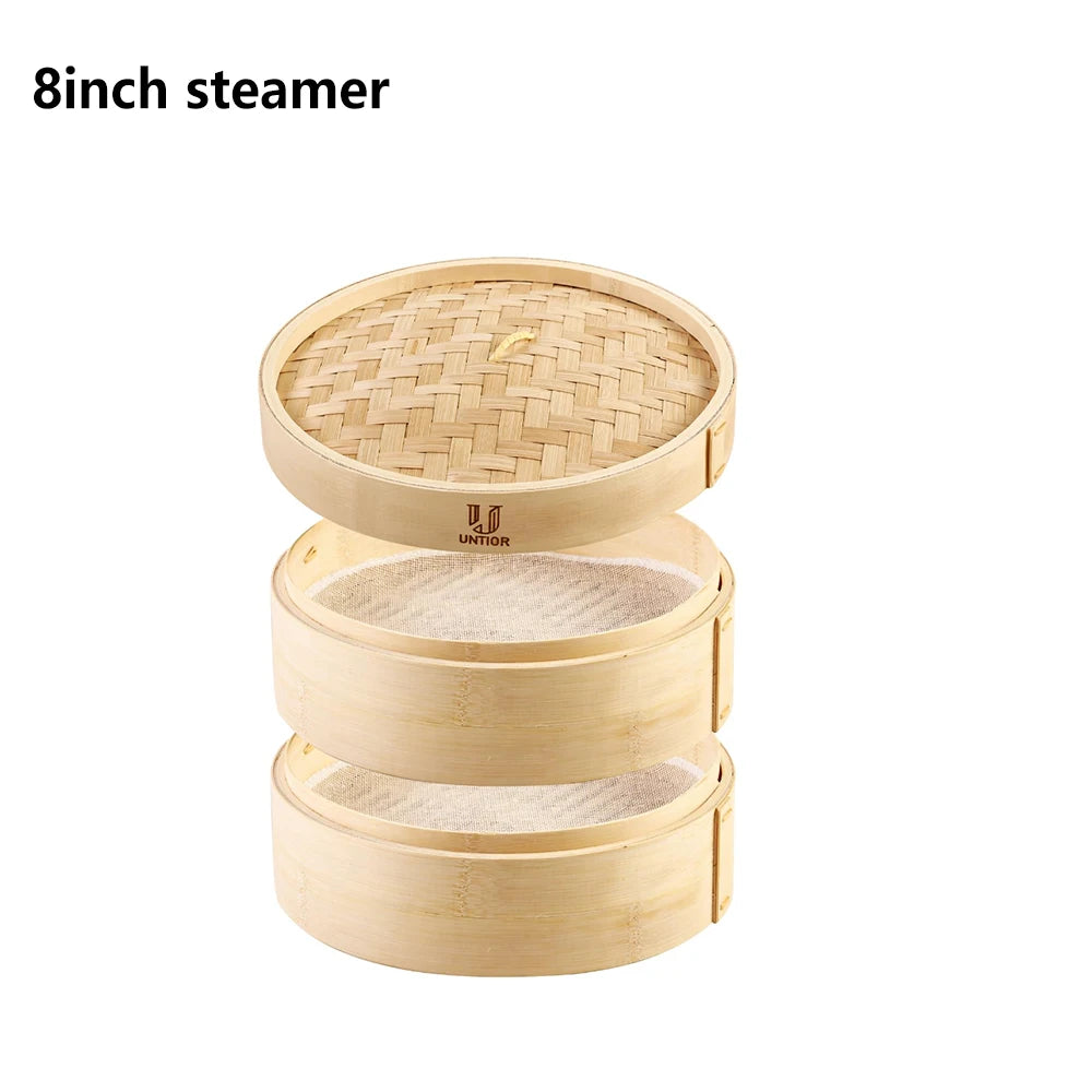 A two-tier light-brown bamboo dumpling steamer with a woven lid and mesh liners.