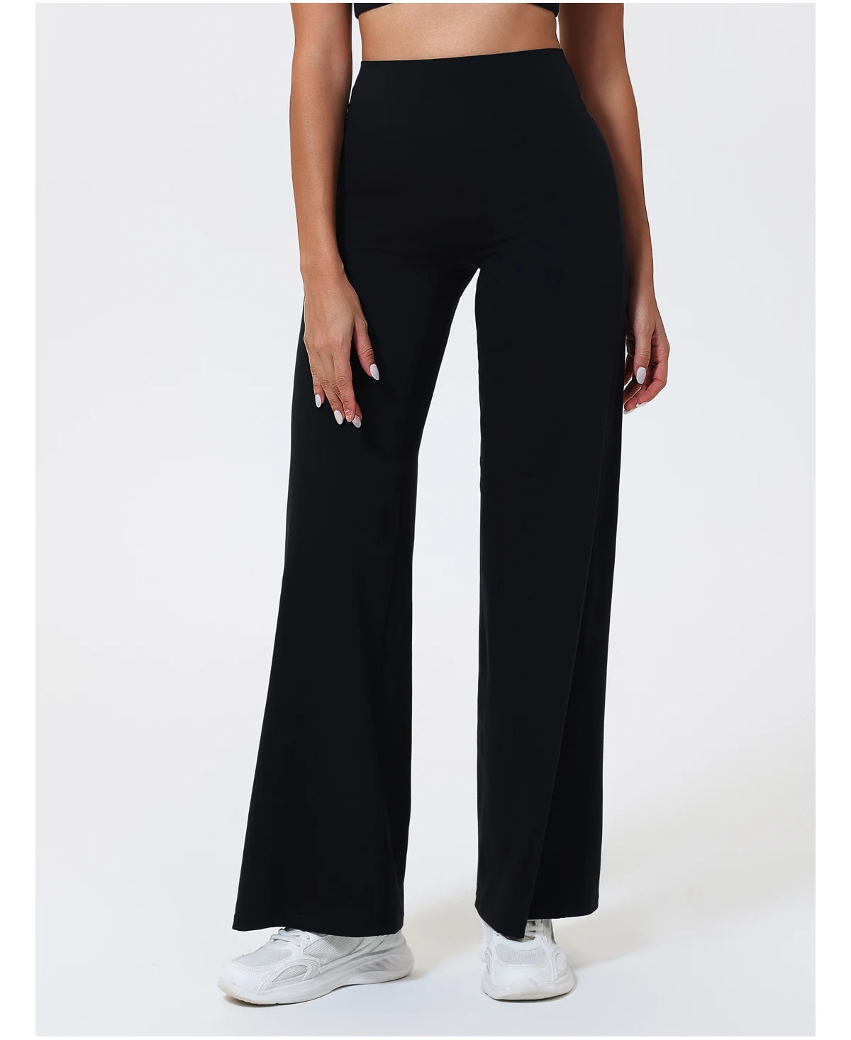 Black high waist sculpting compression leggings in quick-dry knit for workout and daily wear.