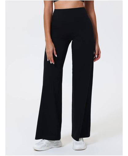 Black high waist sculpting compression leggings in quick-dry knit for workout and daily wear.