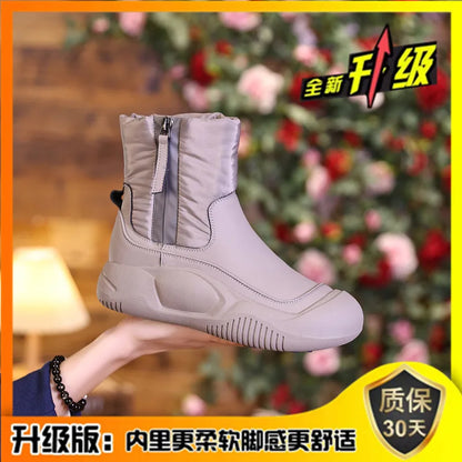 Gray waterproof winter short boot with side zipper, quilted upper, and thick platform sole.