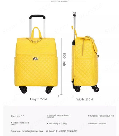 Yellow PU leather quilted rolling suitcase with a top handle, retractable pull rod, and front twist-lock closure.