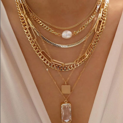 layered crystal pendant necklace set with rhinestones and metal chains