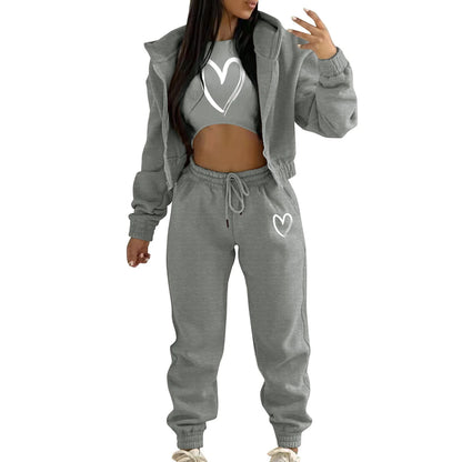 Gray knit sweater set with white heart print, featuring a hooded, relaxed fit, ideal for lounging.
