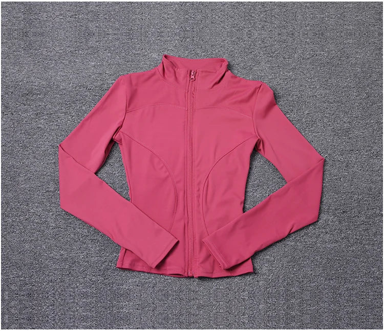 Rose pink long sleeve polyester jacket with a fitted design and zip front for gym training or yoga.