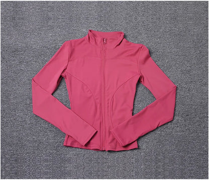 Rose pink long sleeve polyester jacket with a fitted design and zip front for gym training or yoga.