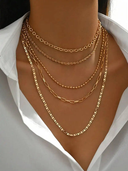 Women's Goldtone Necklace Set With Braided Bead Chains And Star Pendants In Five-Length Array