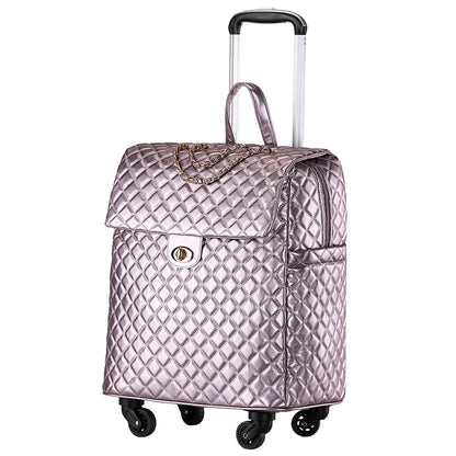 Metallic pink quilted PU leather rolling suitcase with a front flap, twist lock, chain, and retractable handle.