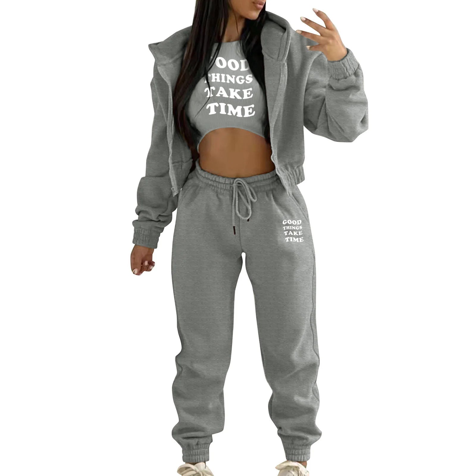 Grey knit sweater set with white letter print, hooded zip jacket, and high waist joggers for lounging.