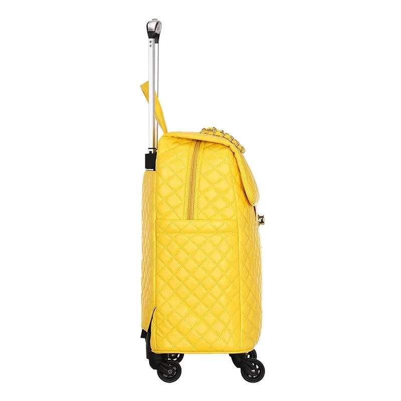 Yellow quilted PU leather retro rolling suitcase with a telescoping handle and wheels.