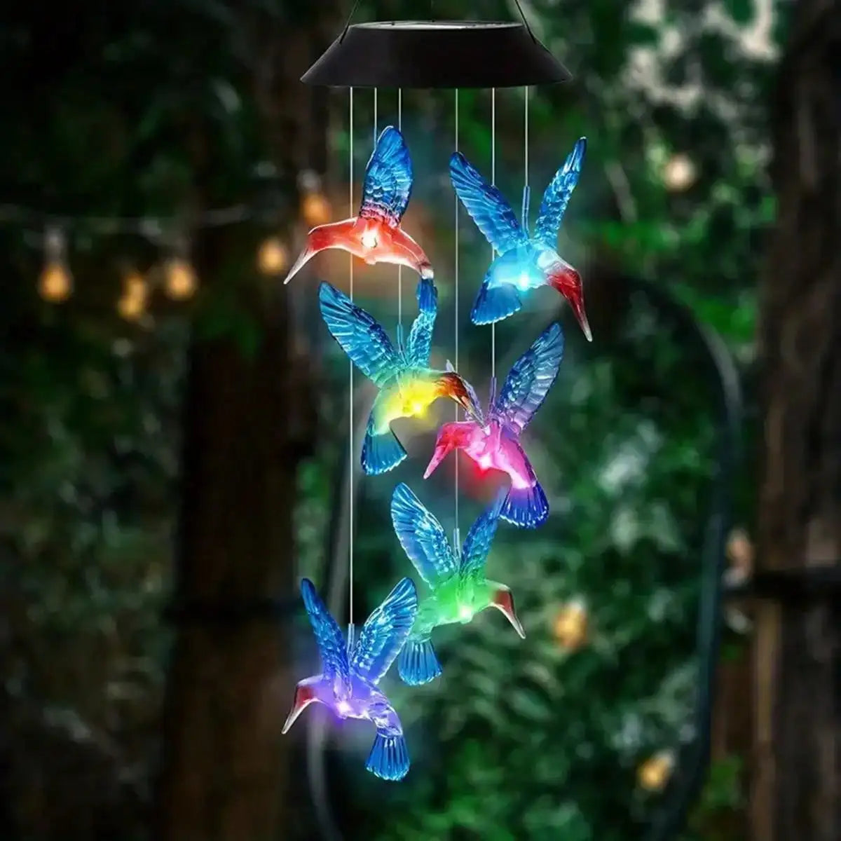 Solar wind chimes hanging outdoor light with glowing acrylic hummingbirds for garden patio