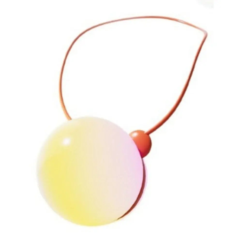 A yellow and white plastic sphere with an orange cord for interactive language learning robot toy play.