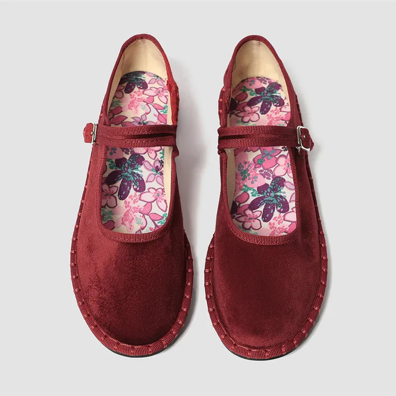 Women's floral-lined Mary Jane flats with buckle strap