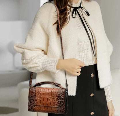 Women's crocodile-embossed crossbody bag with top handle