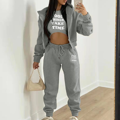 Grey plush knit sweater set with white letter print and relaxed fit for lounging.