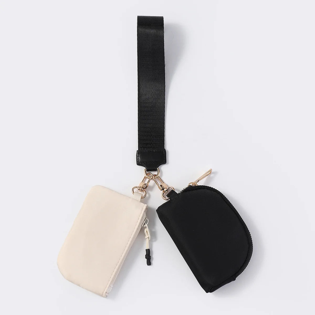 Black and cream nylon dual pouch wristlet wallet with zip closure for daily errands.