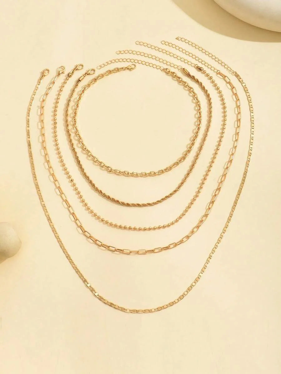 Women's Goldtone Necklace Set With Braided Bead Chains And Star Pendants In Five-Length Array