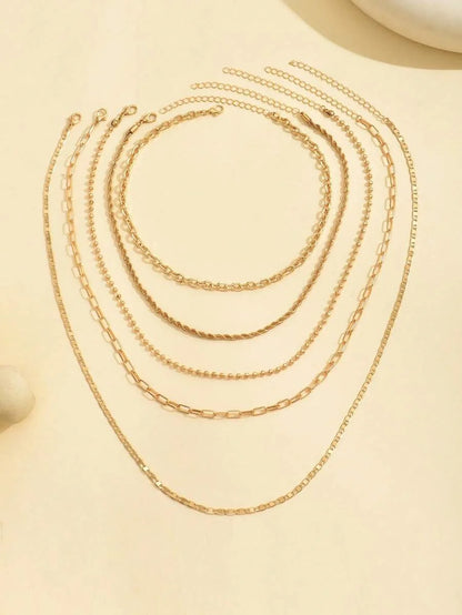 Women's Goldtone Necklace Set With Braided Bead Chains And Star Pendants In Five-Length Array