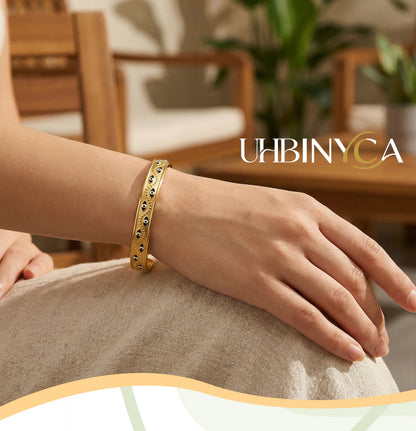 Women’s stainless steel cuff bracelet with an evil eye motif