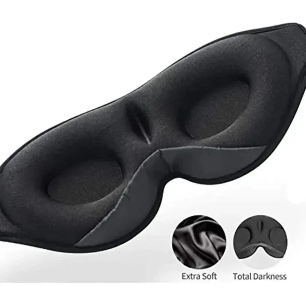 Black 3D contoured wireless sleep eye mask with molded eye cups and a soft fleece-like texture.