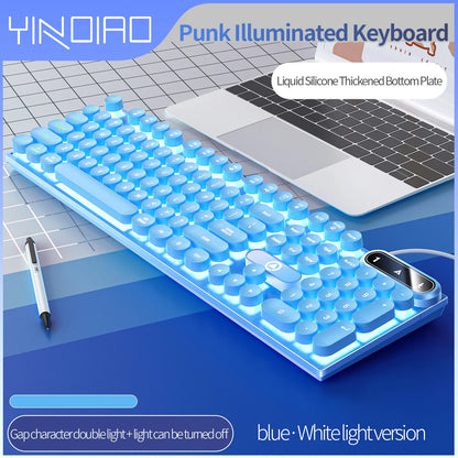 Mechanical keyboard with round retro LED backlit keys and illuminated typewriter style buttons