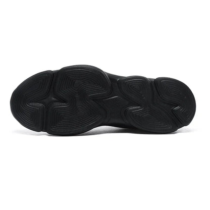Black rubber non-slip sneaker sole with a wavy, textured traction pattern for daily walking.
