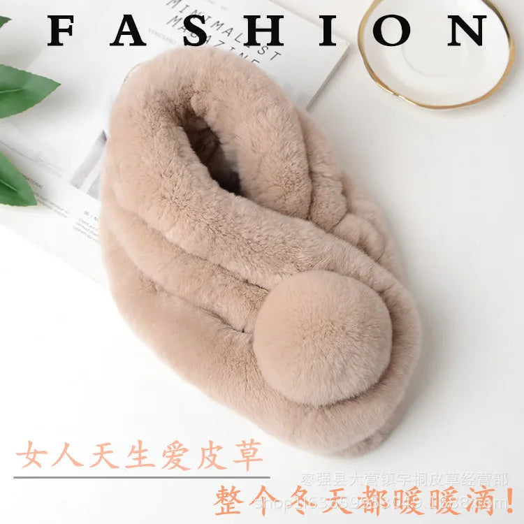 Beige rabbit fur short winter scarf with a triple tube design and a pom pom detail.