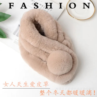 Beige rabbit fur short winter scarf with a triple tube design and a pom pom detail.