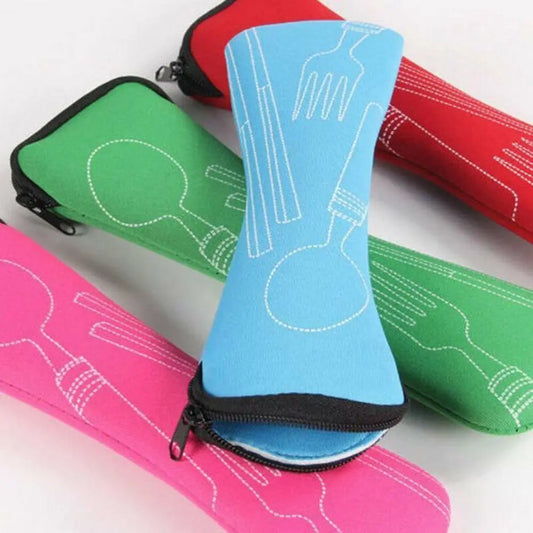 Travel utensil organizer pouches in blue, green, pink, and red with zipper closure and stitched flatware outline