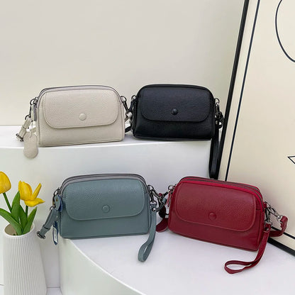 Women's phone crossbody bag with an interior zip pocket
