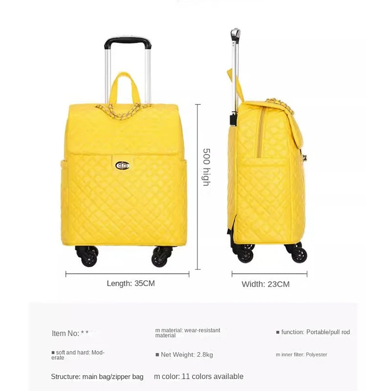 Yellow quilted PU leather rolling luggage with a retractable handle, front twist-lock flap, and chain accent.