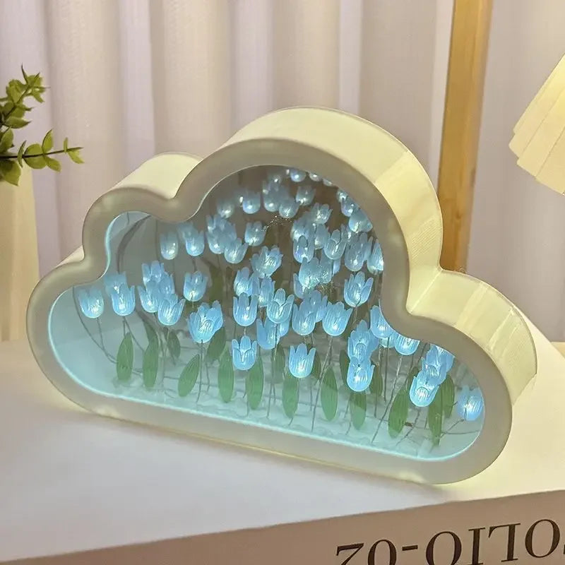 Cloud-shaped LED home decor with blue tulip glass flowers and a white frame for ambient desk lighting.
