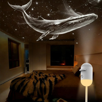 White portable LED galaxy star projector casts a glowing whale nebula on the ceiling for bedroom relaxation.