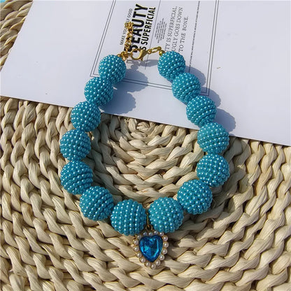 Heart-detail pet collar with pearl-style accents