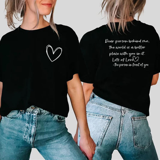 Black t-shirt with a front heart outline and encouraging text on the back.