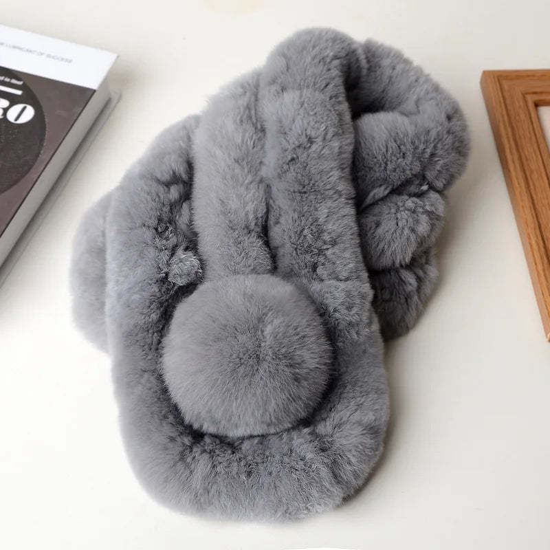 Grey fur short scarf with triple tubes and a round pom pom detail.