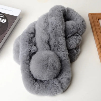 Grey fur short scarf with triple tubes and a round pom pom detail.