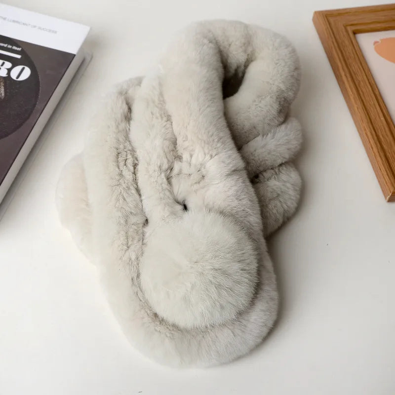 Thick, off-white rabbit fur triple-tube scarf featuring a soft pom-pom detail.
